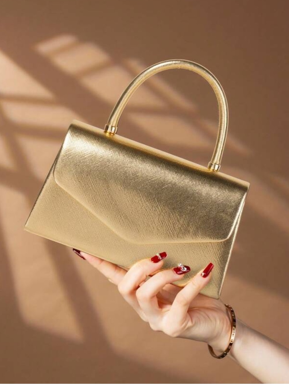 Gold Mini Top-Handle Clutch Bag